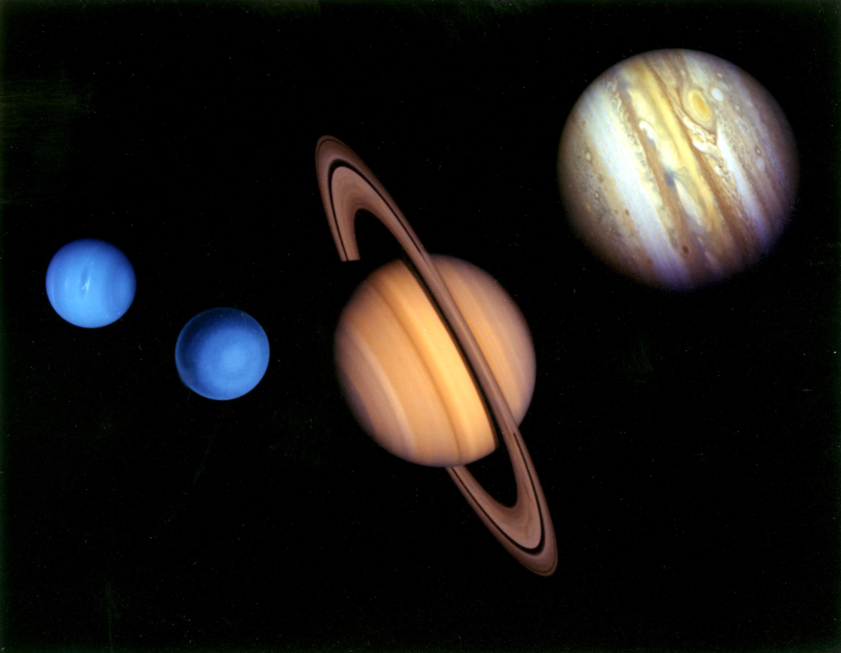 Voyager Tour Montage — composite of Jupiter, Saturn, Uranus, and Neptune as seen by the Voyager spacecraft.