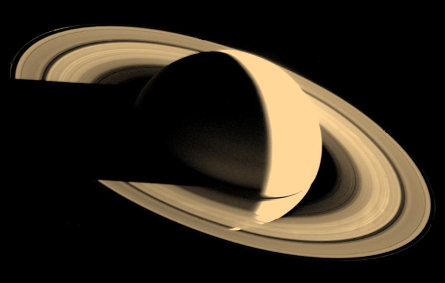 Voyager 1 looks back at Saturn four days after flyby, November 16, 1980, showing the rings and spoke features.