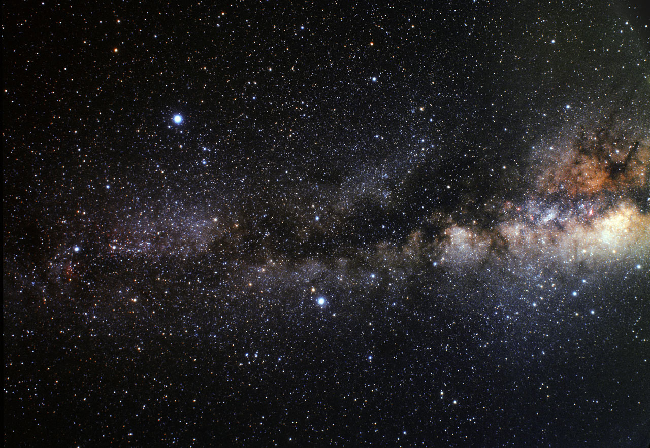 Wide-field image of the Summer Triangle stars Vega, Deneb, and Altair.