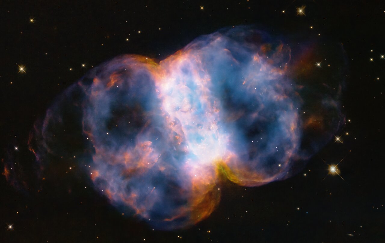 Hubble image of the Little Dumbbell Nebula M76 in Perseus.