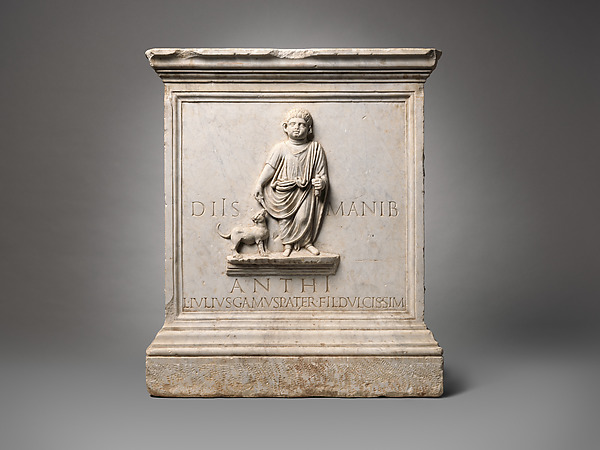 Roman funerary inscription opening with the letters D M, Dis Manibus